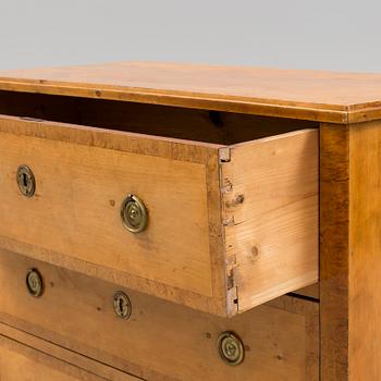 a chest of drawers from the 19th century.