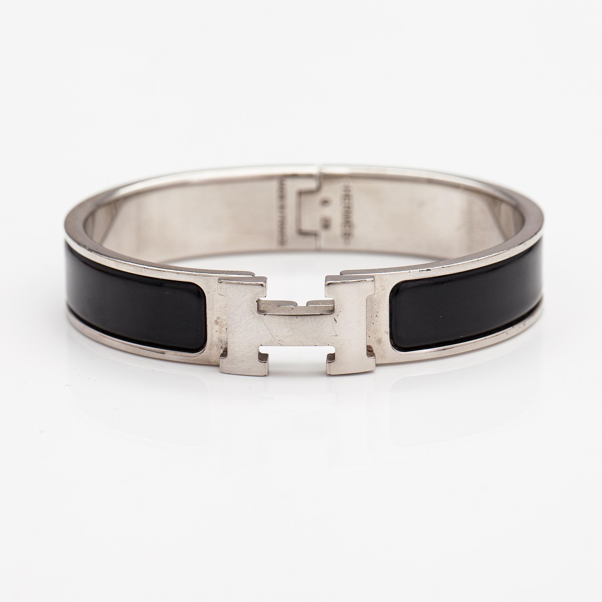 Hermès, armband, "Clic H PM", silverfärgad metall och svart emalj.