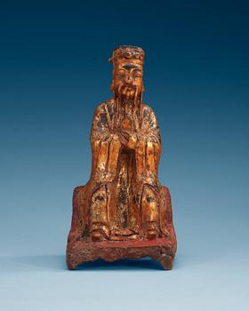 1473. A lacquered and gilt bronze figure of a daoist dignitary, Ming dynasty (1368-1644).