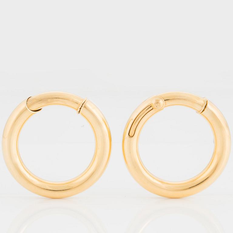 A pair of Cartier earrings.