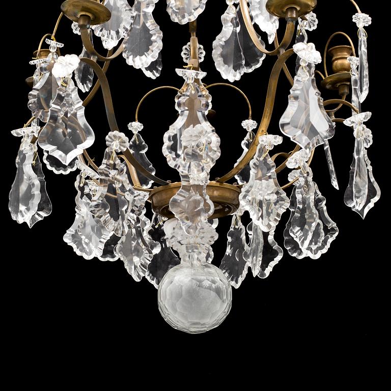 A Rococo style chandelier, mid 20th Century.