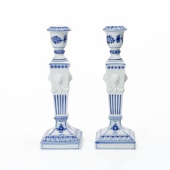 Royal Copenhagen, Candlesticks, a pair, porcelain, "Musselmalet", Denmark, 1935–1936 & 1980–1984.