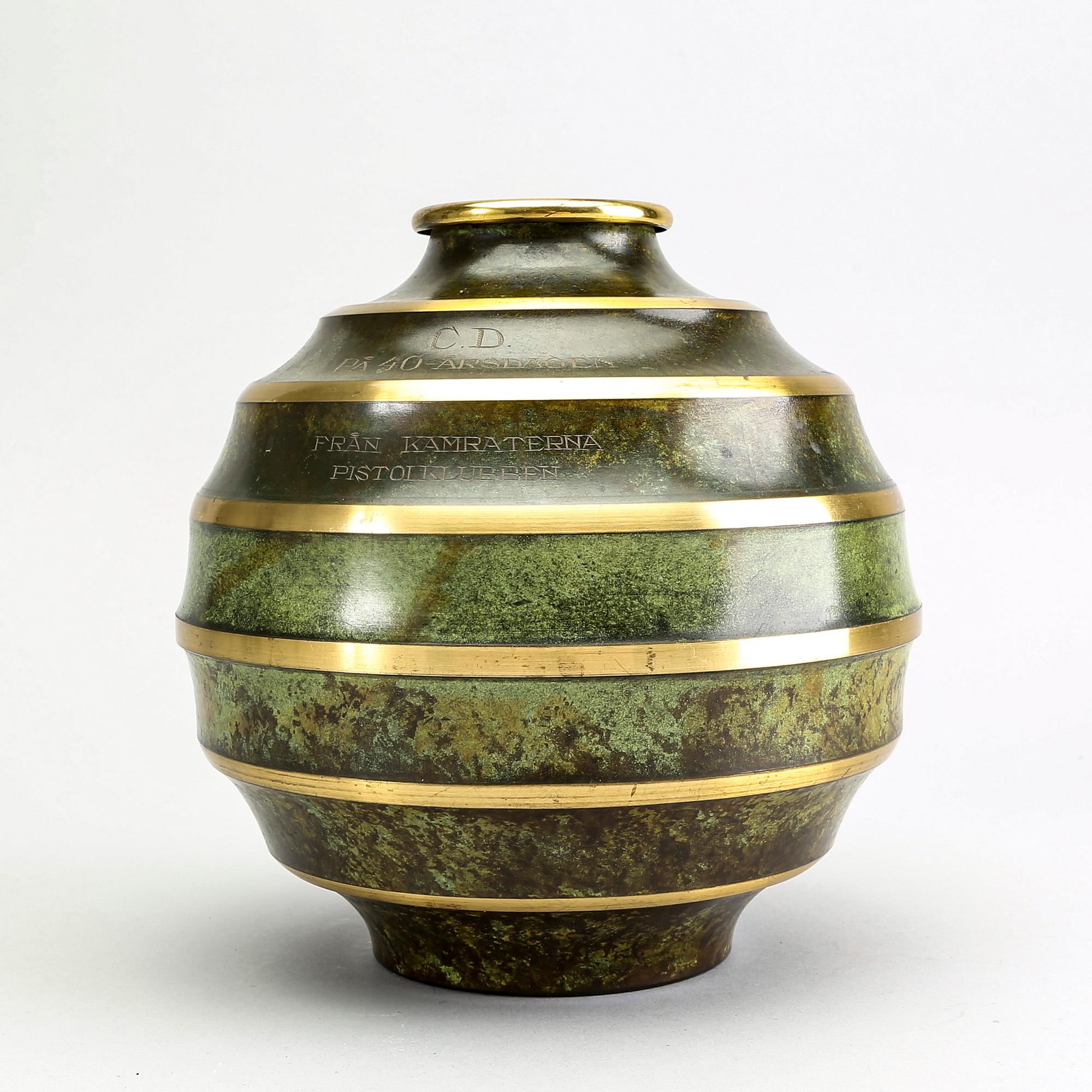 A Swedish Art Deco metal vase.