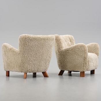 Fritz Hansen, a pair of easy chairs model "1669", Denmark, 1940s.