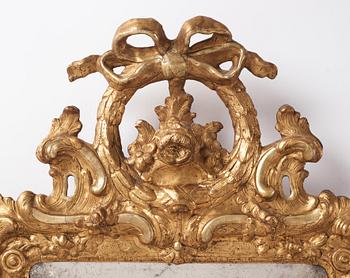 A giltwood rococo mirror by J. Åkerblad (master 1758-99).