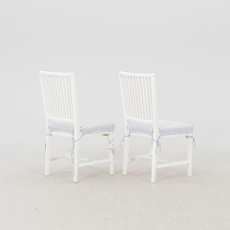 A set of 10 painted Gustavian style chairs from IKEA later part of the 20th century.