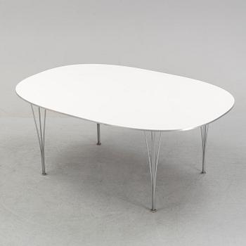 A 'Super elliptical' dining table by Bruno Mathsson & Piet Hein for Fritz Hansen, dated 1995.