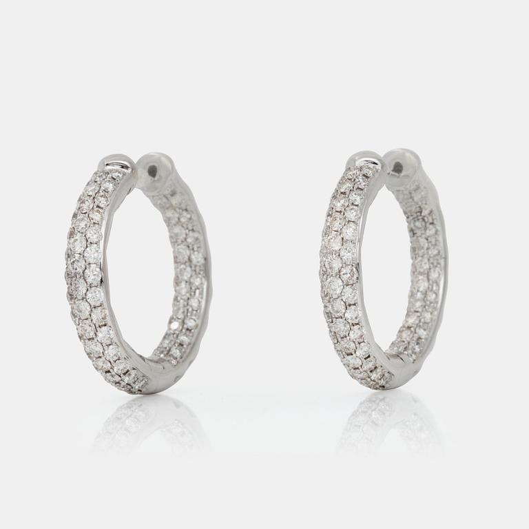 A pair of loop diamond earrings, 2.58 cts in total, according to engraving.