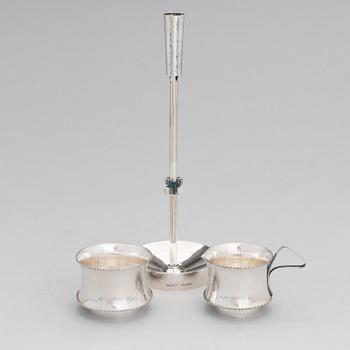 A silver candlestick and cream jug and a sugar bowl, Pirkan-Kulta oy, Tampere 1964 ja 1966.