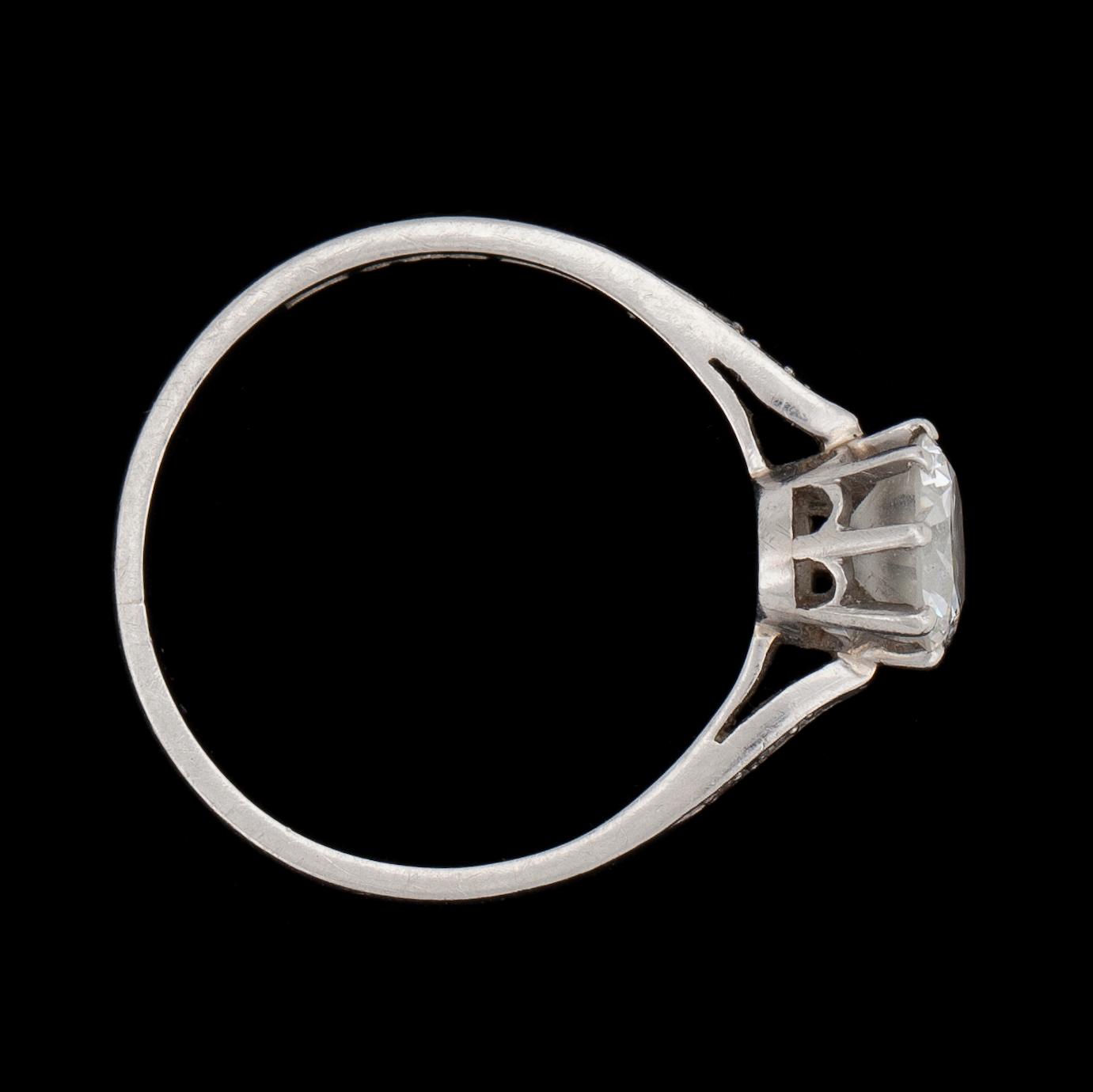 RING, brilliant cut diamond, old cut, app. 0.85 cts, with small diamonds at the sides, Stockholm, 1947.
