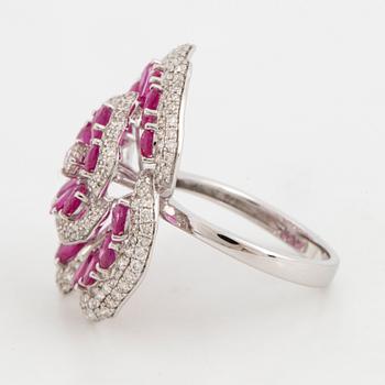 Ruby and brilliant-cut diamond flower ring.