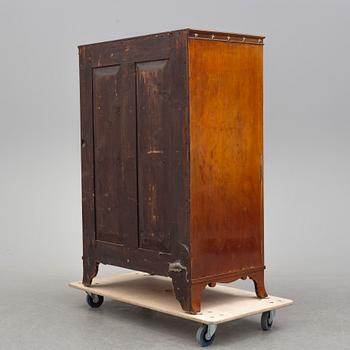A northern european empire chiffonier, first half of the 19th century.