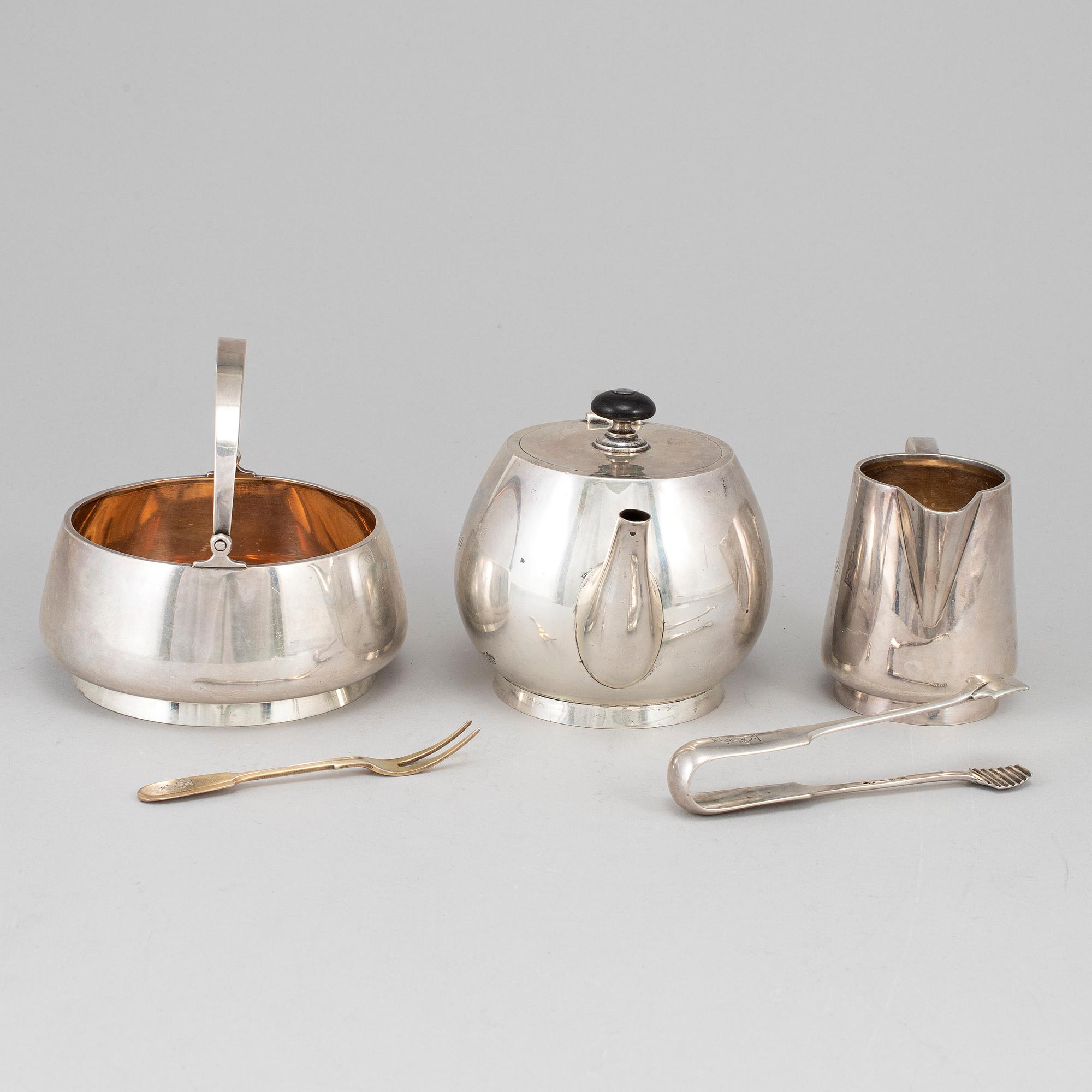 A Russian early 20th century parcel-gilt silver 5 piece tea-set, mark of Grachev, St. Petersburg 1908-1917.