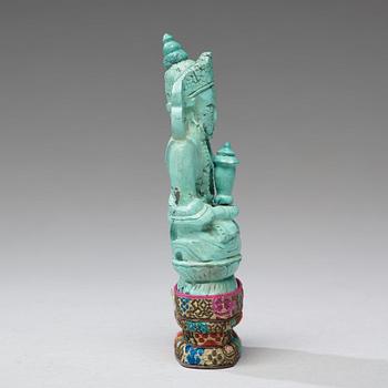 A turquoise figure of a bodhisattva, Tibet, late 19th Century.