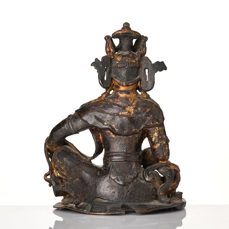 A cold gilt bronze figure of Avalokitshvara, Ming dynasty.