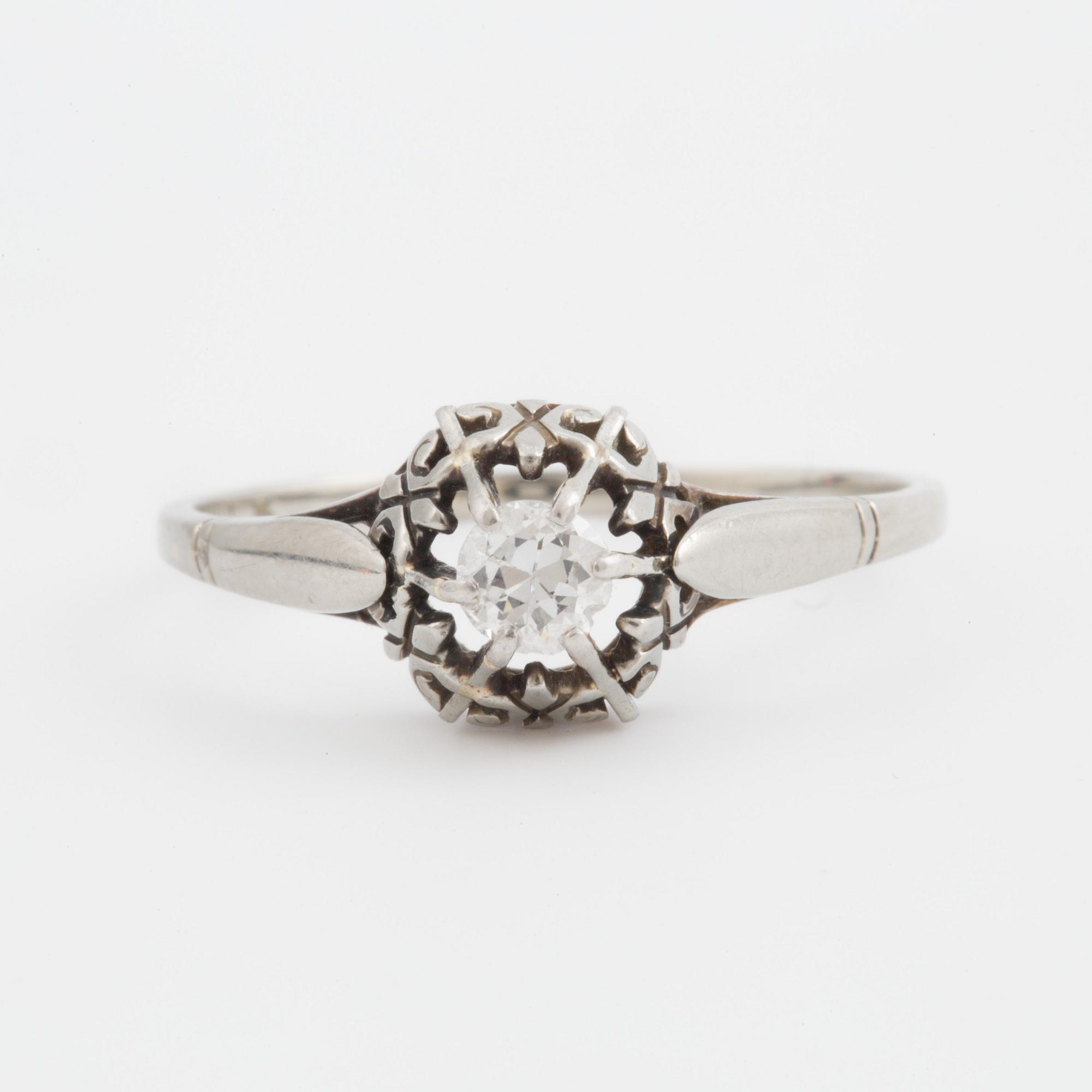 A ring set with a transitional-cut diamond.