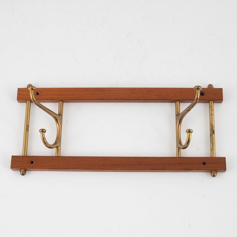 Klädhängare, 3 st, "Dekorativ", AB Skogslunds Metallgjuteri, Anderstorp, 1900-talets mitt.