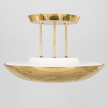 A 1980s brass ceiling light.