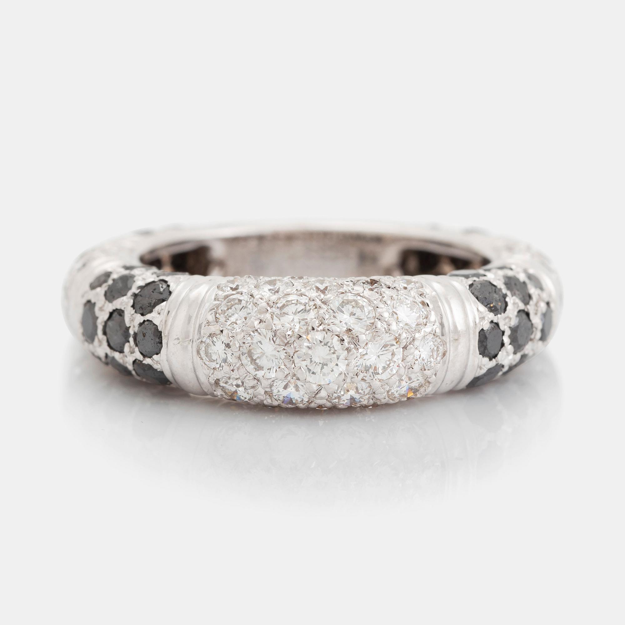 An 18K white gold Grisogono ring set with round brilliant-cut diamonds.