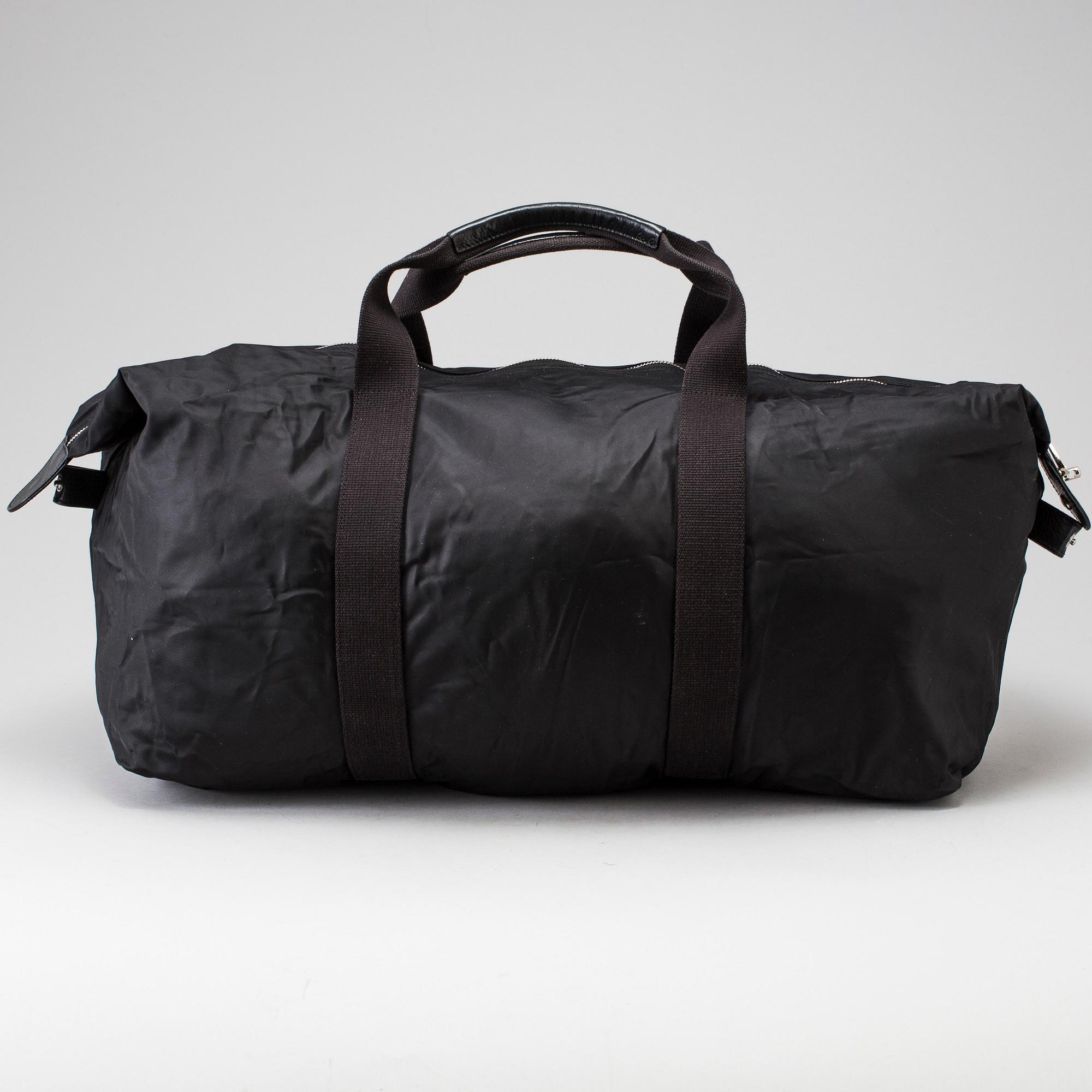 A foldable Mulberry weekend bag.