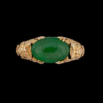 980. A Chinese jade ring.