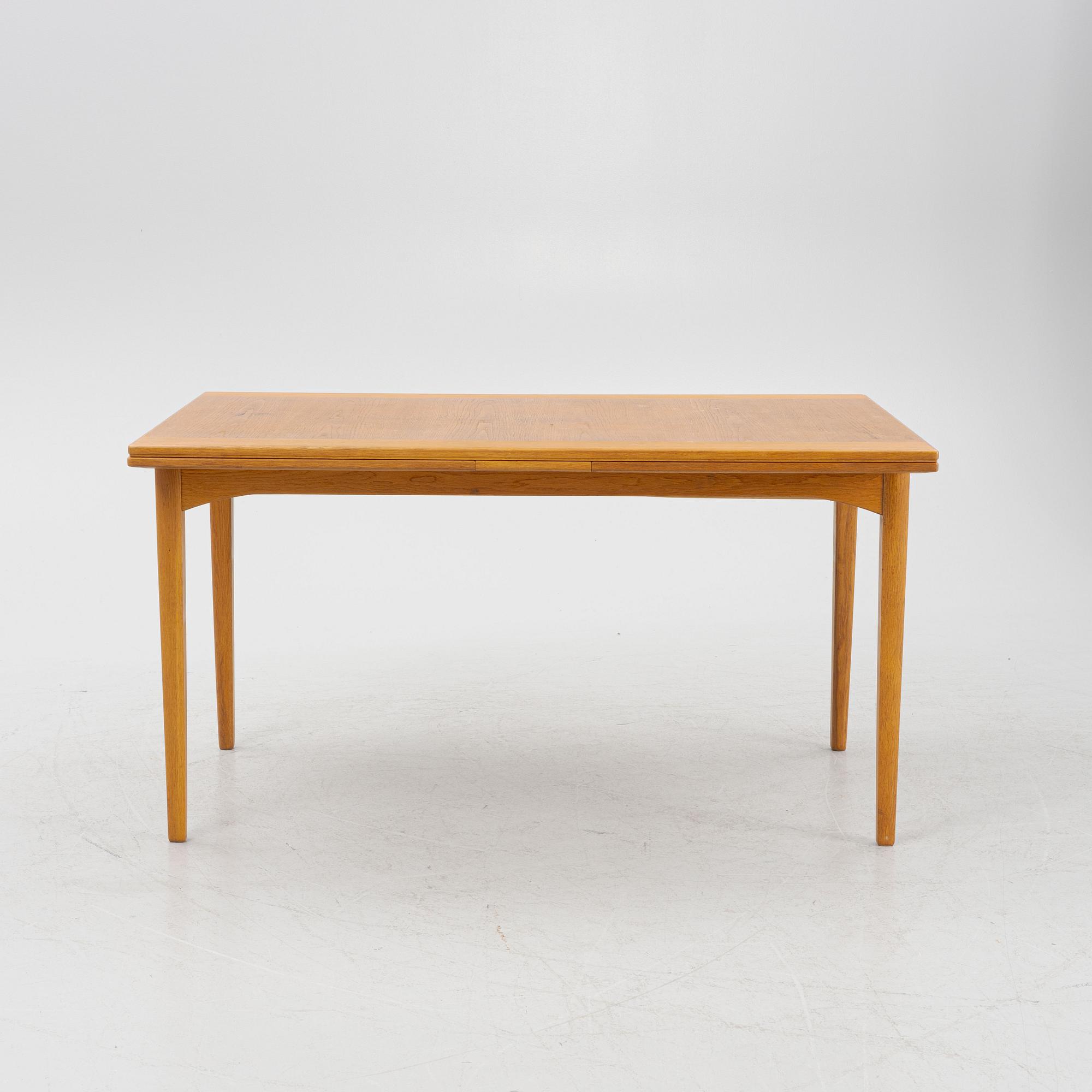 Carl Malmsten, dining table, "Calamare Nyckel", second half of the 20th century.