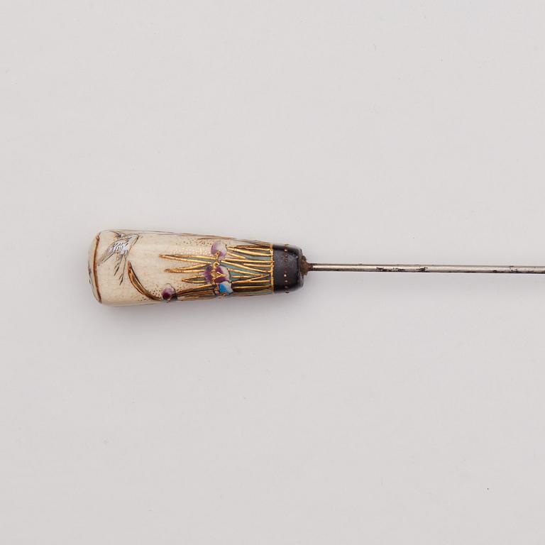 A Japanese painted hat pin, Meiji (1868-1912).