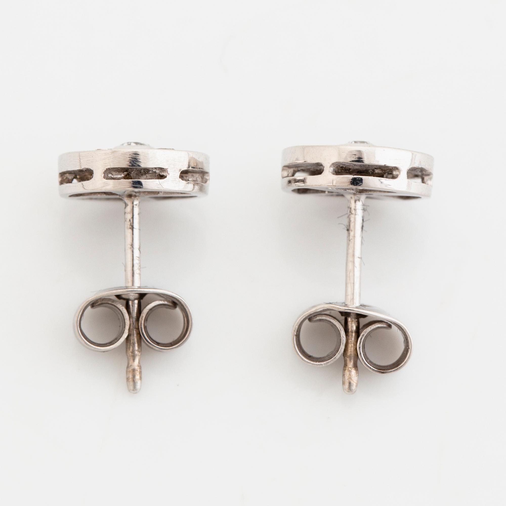 18K white gold, baguette and brilliant cut diamond earrings.