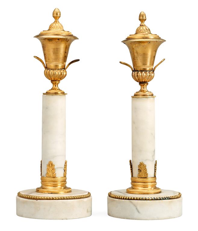 A pair of late Gustavian late 18th century cassolettes.