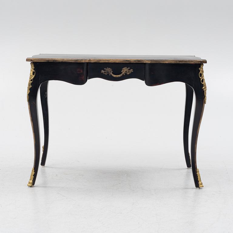 A rococo-style desk from the second half of the 20th century.