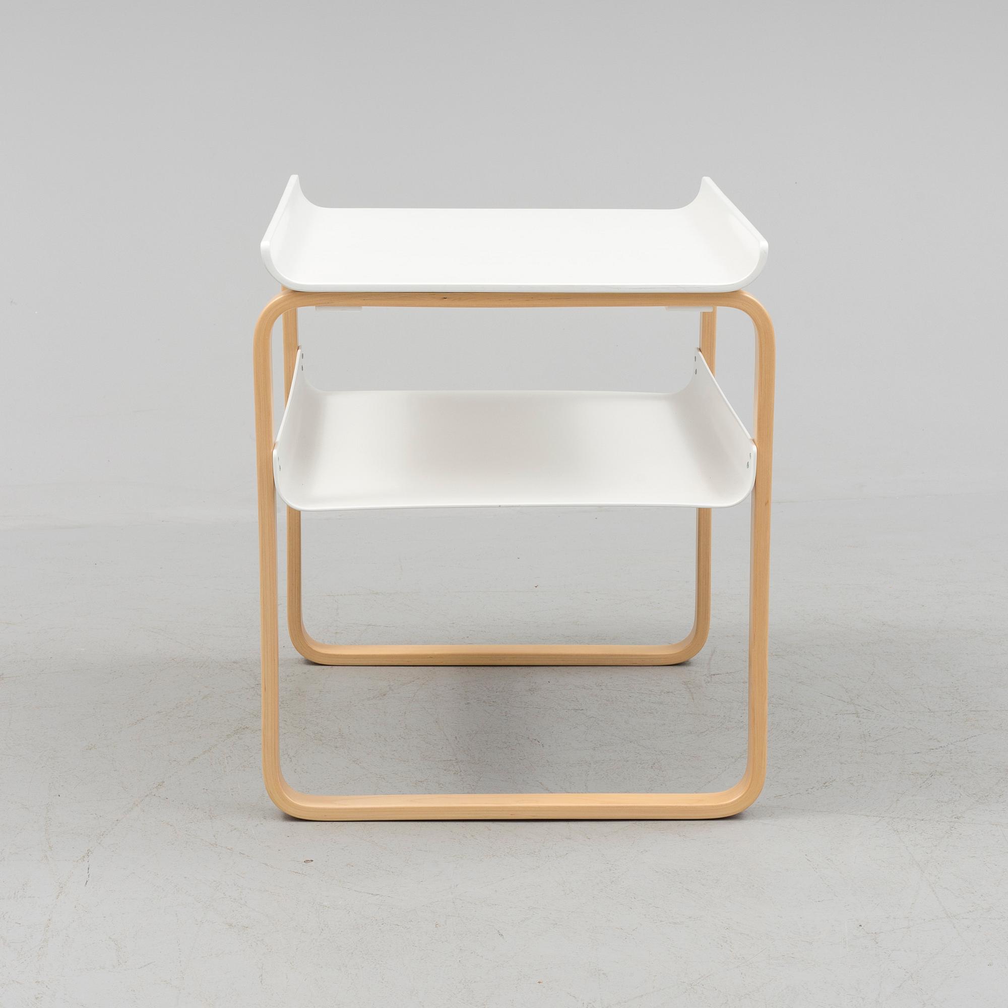 An occational table model 915 by Alvar Aalto for Artek.
