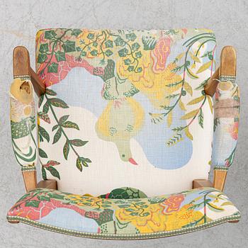 Josef Frank, a pair of model 695 armchairs, Svenskt Tenn.