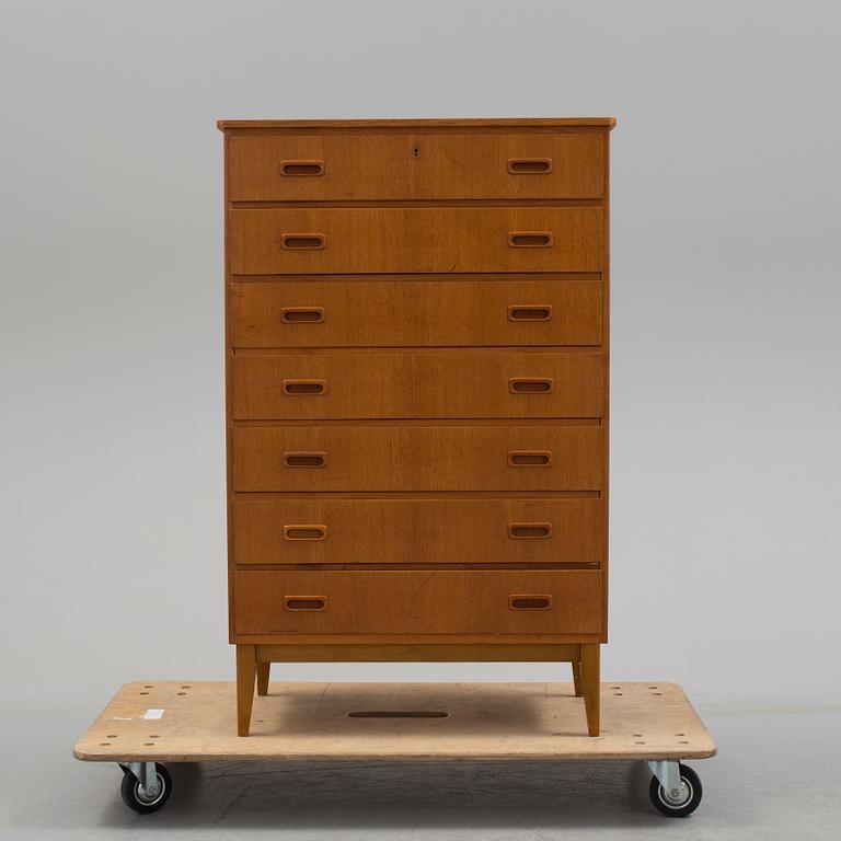 A 1960's teak chest of draws.