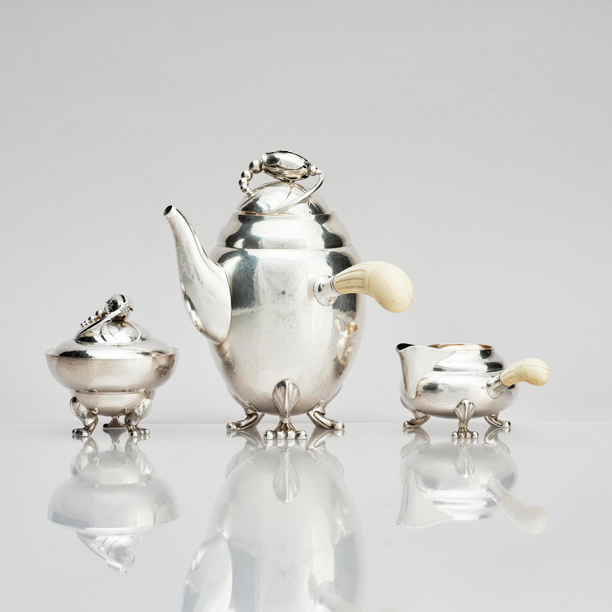 Georg Jensen, a three pieces coffee service in sterling silver, "Magnolia/Blossom", Copenhagen 1933-44.