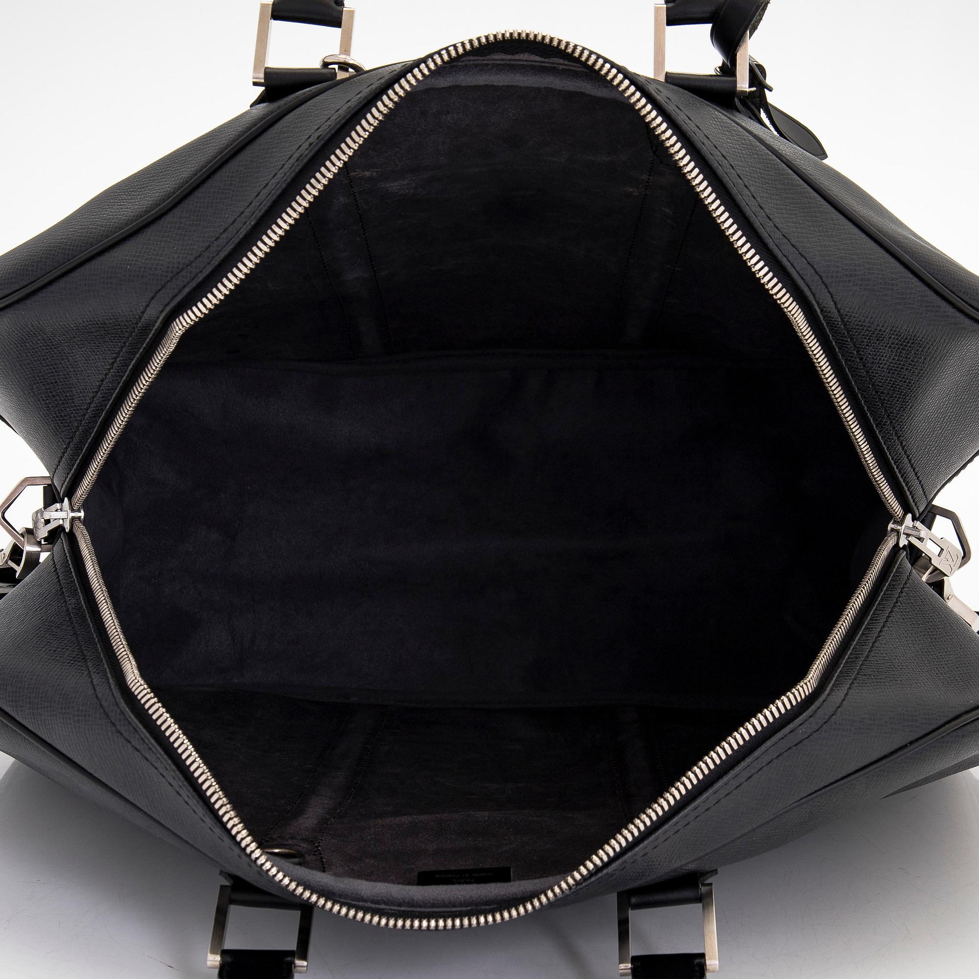 Louis Vuitton, a 'Taiga Kendall PM' weekend bag.