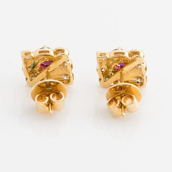 Earrings, gold, with rubies and brilliant-cut diamonds.