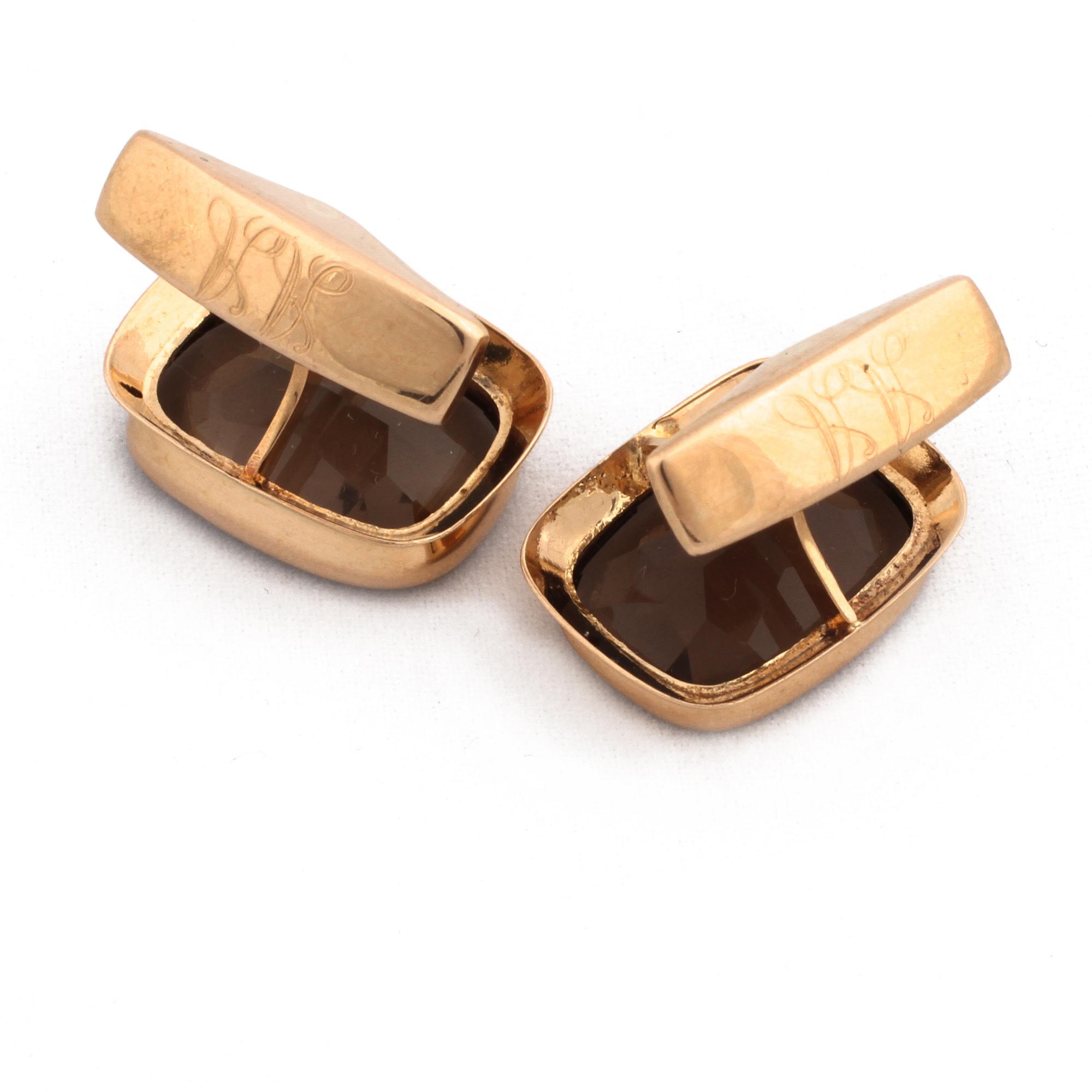 MANSCHETTKNAPPAR, 14K guld med fasettslipad rökkvarts, stämplade RL, Turku, Finland, 1967. Vikt 7,3 g.