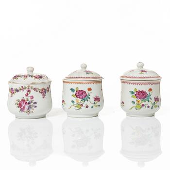 A group of 12 CHinese famille rose porcelain custard cups with covers, Qing dynasty, 18th century.