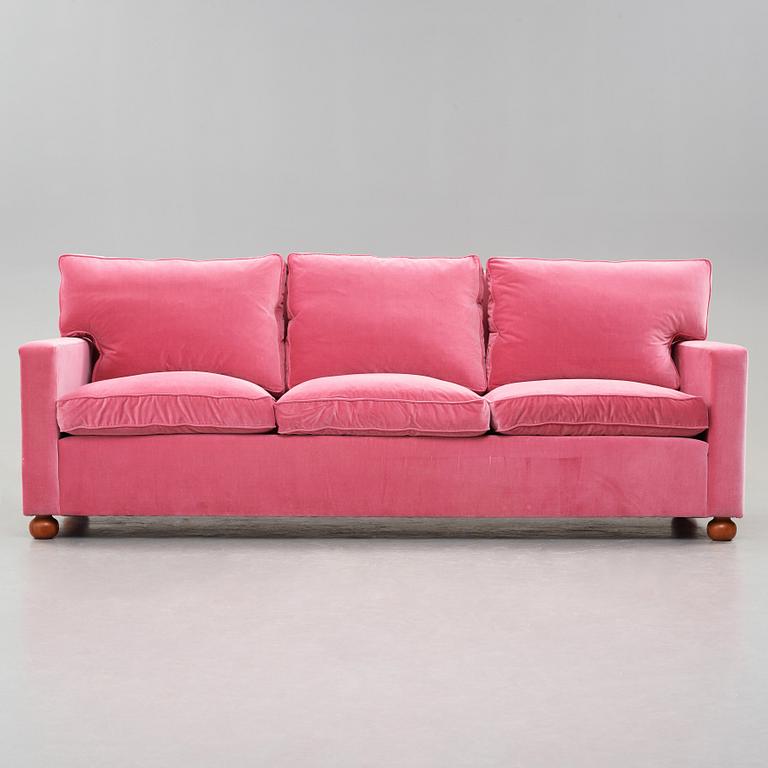 Josef Frank, a pink velvet upholstered three seated sofa, Svenskt Tenn, model 3031.