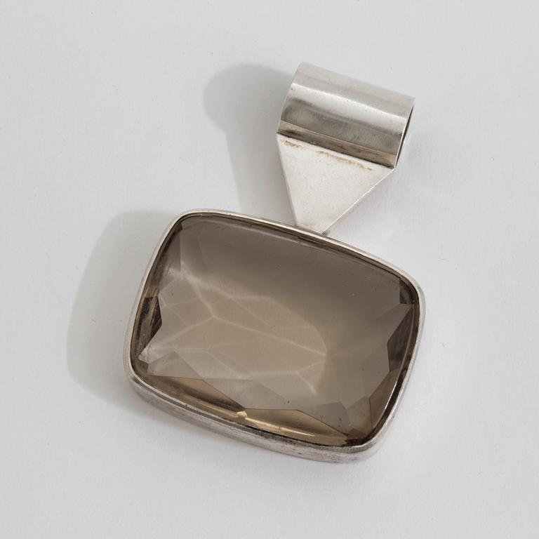 A smoky quartz pendant by Karl-Ingmar Johansson, Göteborg, 1961.