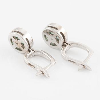 Earrings, 14K white gold with emeralds and brilliant-cut diamonds.