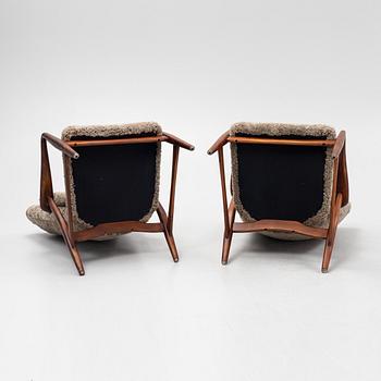 Ib Madsen & Acton SChubell, a pair of 'Pragh' armchairs, Madsen & SChubell Co, Denmark, 1940's/50's.