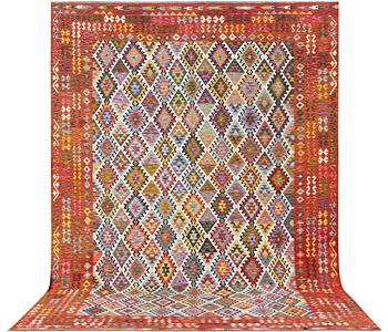 A Kilim carpet, c. 443 x 313 cm.