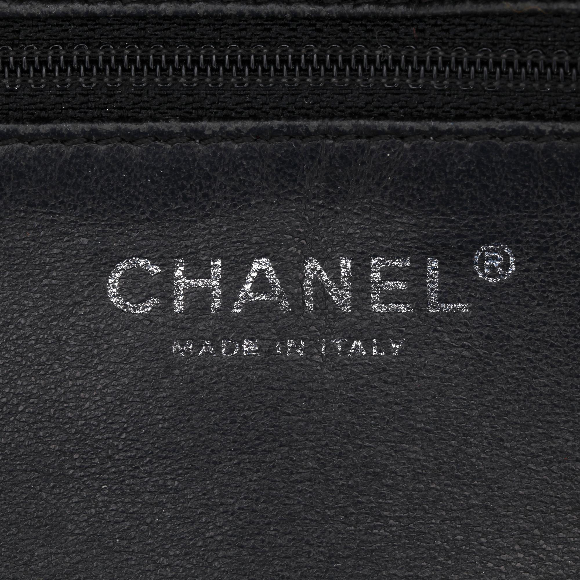 CHANEL, a black leather shoulder bag.
