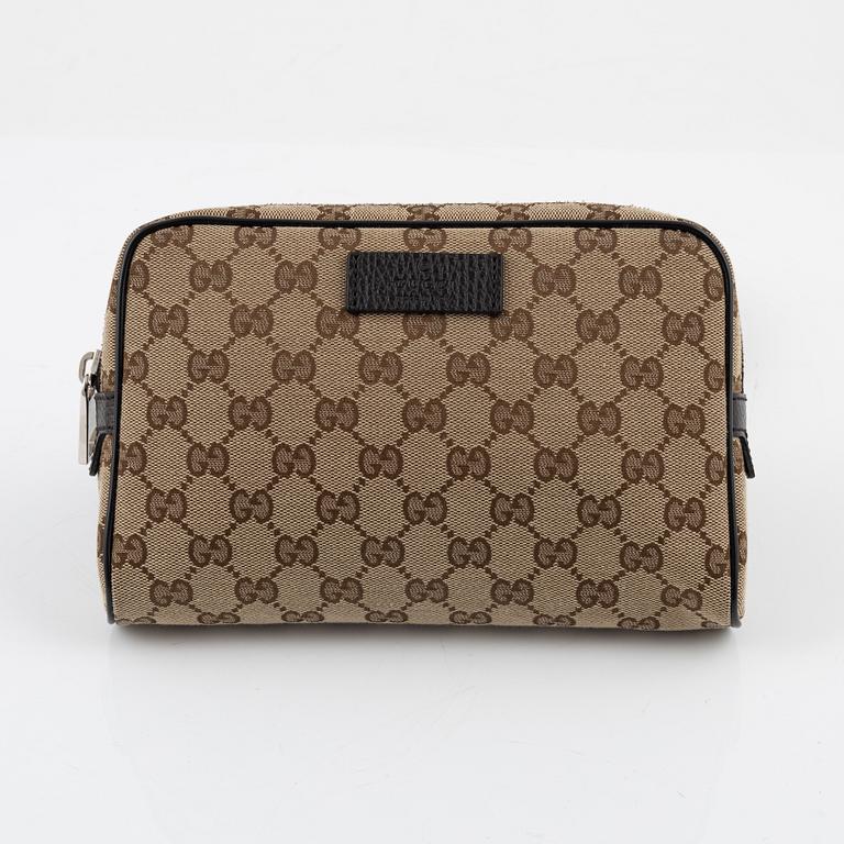 Gucci, a belt bag.