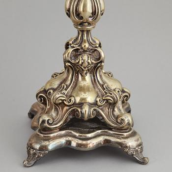 A pair of barocque style nine lights candelabra, silver plate, 20th Century.