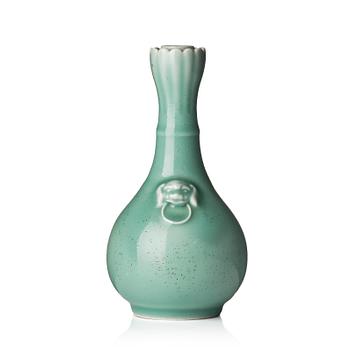 A celadon glazed vas, late Qing dynasty, with Yongzheng mark.