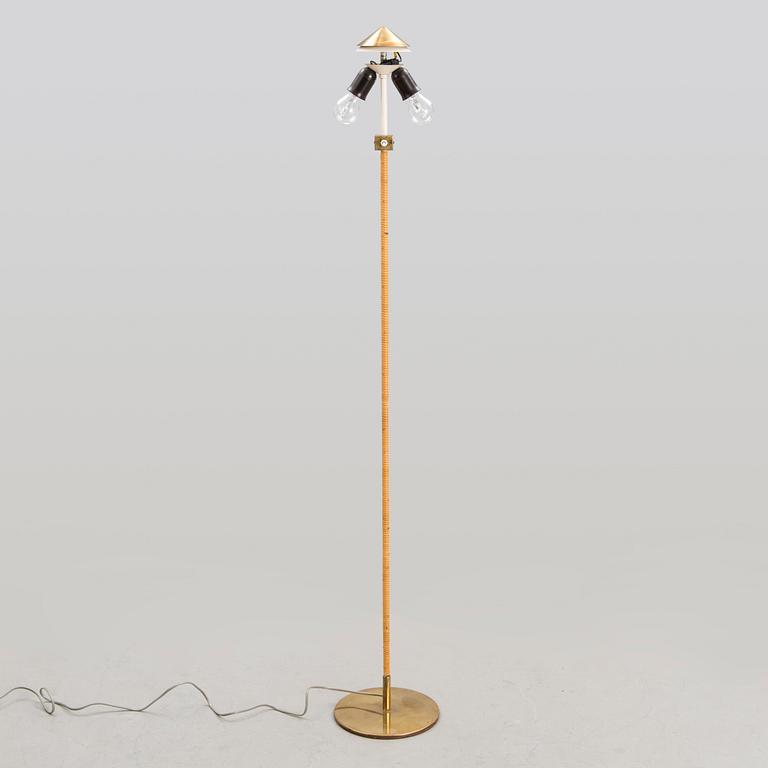 A mid-20th century floor lamp for Taito, Finland.