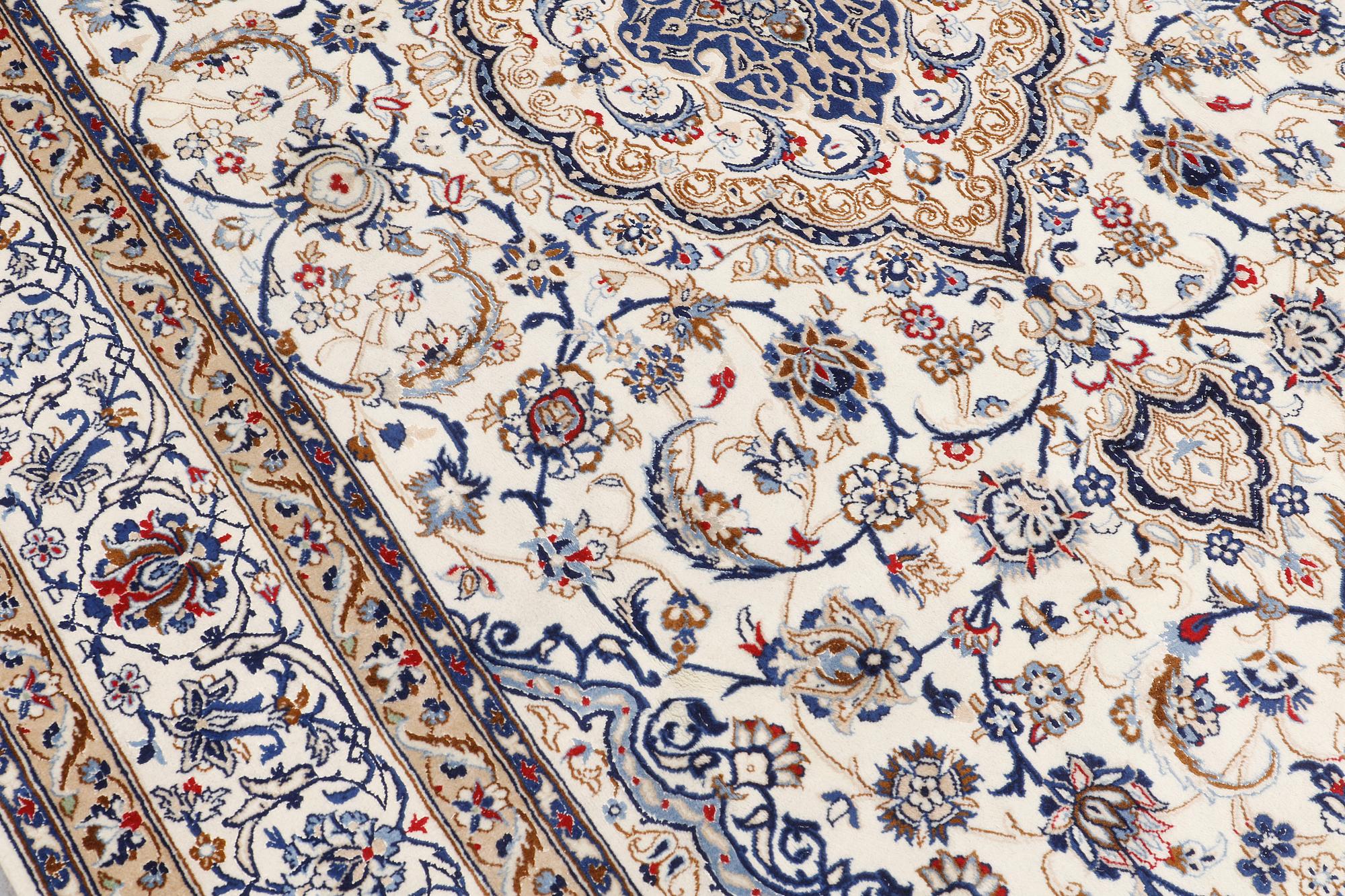 A carpet, Nain Part silk, 312 x 207 cm.