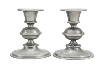 12. A PAIR OF PEWTER CANDLESTICKS,